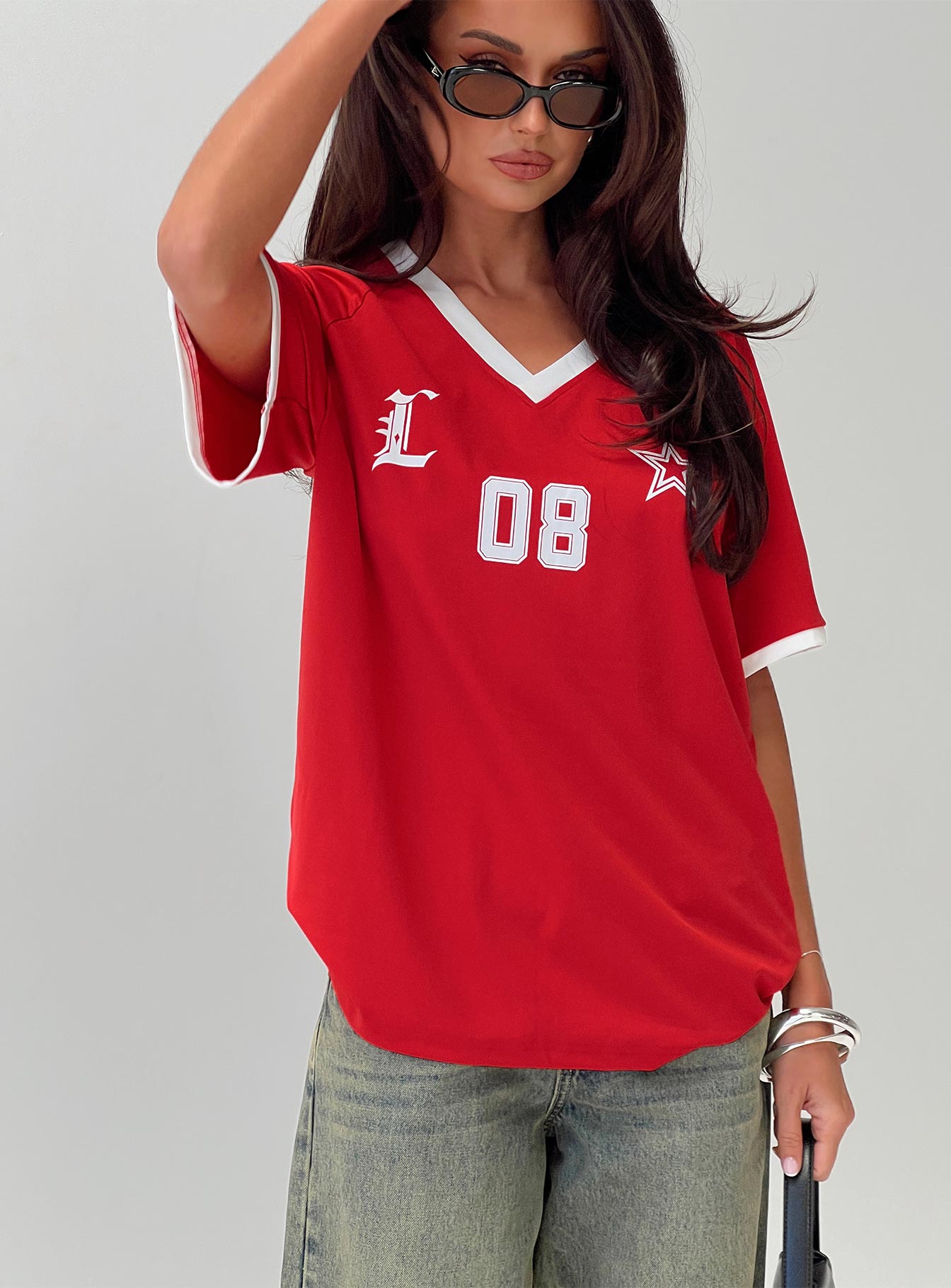 front view of model wearing Princess Polly Spectate Top Red Short Sleeves V-Neck 