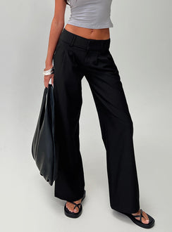 front view of model wearing Princess Polly Two Lovers Low Rise Pants Black Petite Low Rise Pants 