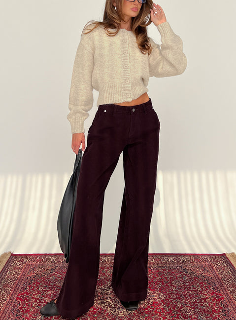 front view of model wearing Princess Polly Jacynda Low Waist Wide Leg Corduroy Jeans Currant Mid Rise Jeans 