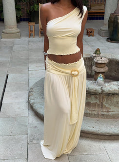   side view of model wearing Princess Polly Full Orbit Shirred Maxi Skirt Cream Maxi 