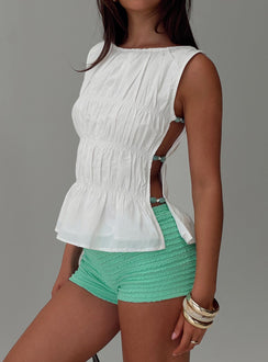 back view of model wearing Princess Polly Think Fast Shorts Aqua High Waisted Shorts 