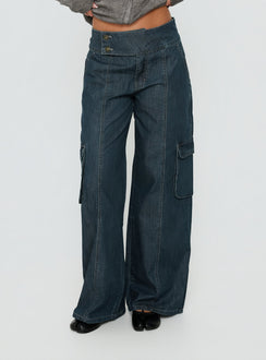 Showcasing the Nikoletta Mid Rise Wide Leg Cargo Jeans Dark Blue Wash in womens-jeans with mid-rise front view of model wearing