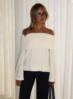 Showcasing the Margarete Off Shoulder Knit Sweater Cream womens jumper with short length in a front view of model wearing Princess Polly