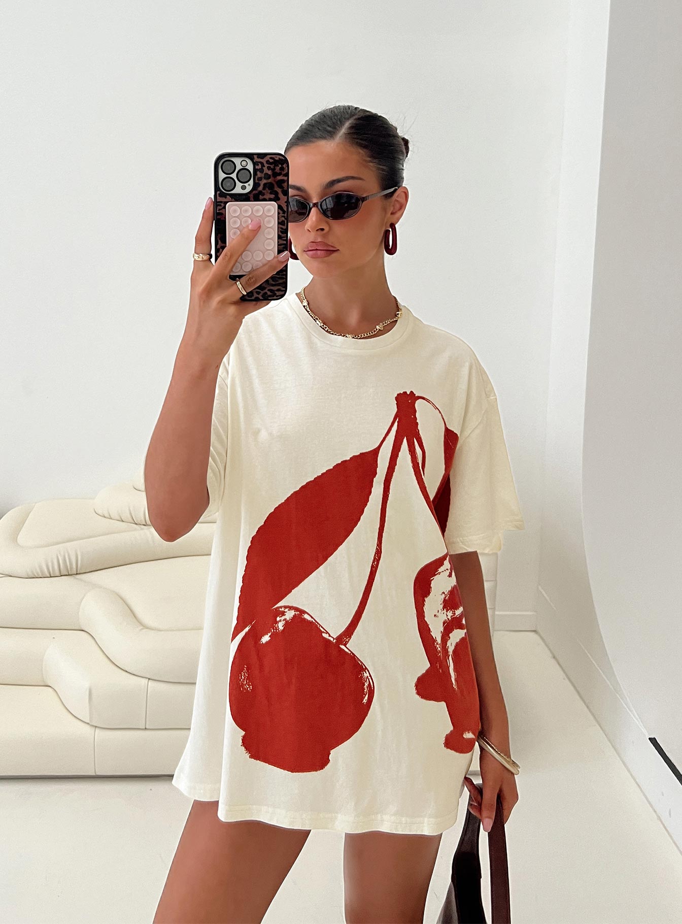 back view of model wearing Princess Polly Cherrie Amore Oversized Tee White Half Sleeves Crew Neck 