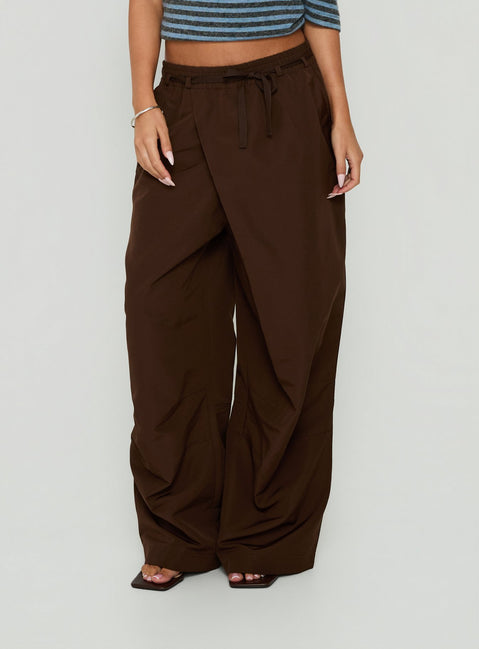 Showcasing the Signora Elasticated Waist Pants Chocolate in womens-regular-pants with a high-rise waist and wide-leg silhouette front view of model wearing Princess Polly