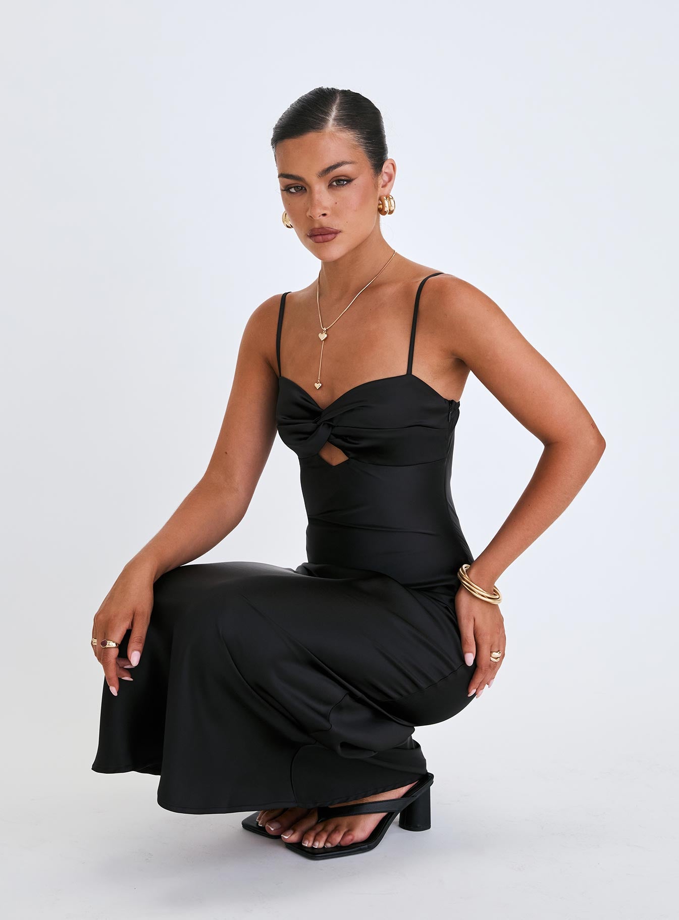 back view of model wearing Princess Polly Blackthorn Maxi Dress Black Sweetheart Neckline 