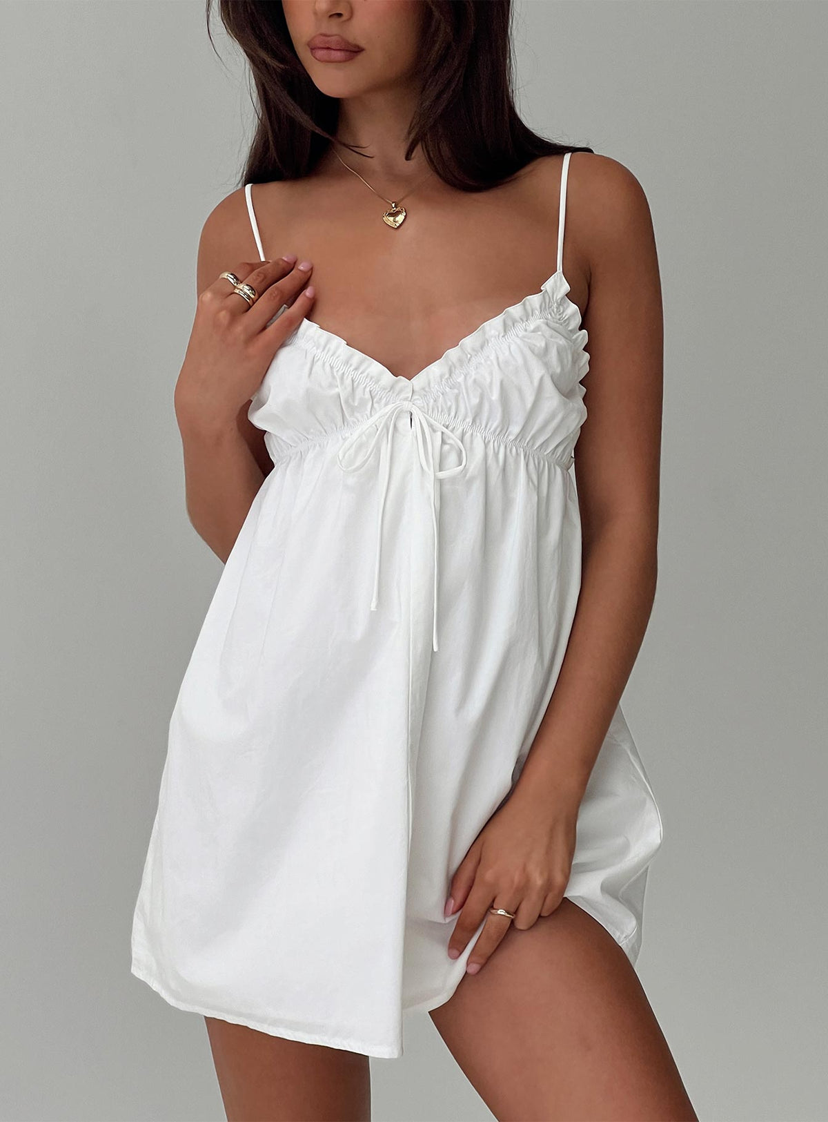 front view of model wearing Princess Polly Alchemy Mini Dress White V-Neck 