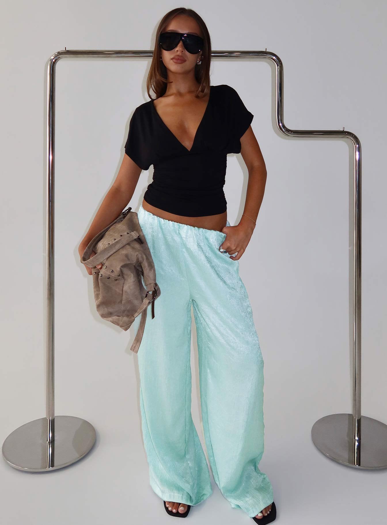 front view of model wearing Princess Polly Salona Satin Straight Leg Pants Jelly Mint Mid Rise Pants 