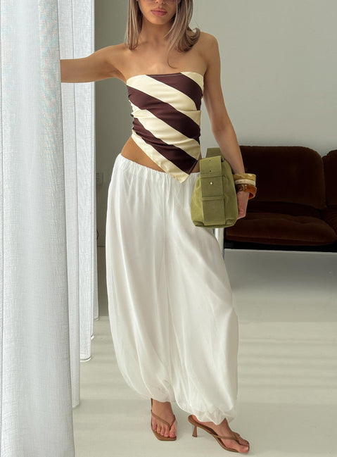 front view of model wearing Princess Polly Mirosa Balloon Leg Pants White Mid Rise Pants 