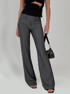back view of model wearing Princess Polly Kinkirk Flared Pants Grey Pinstripe Petite 