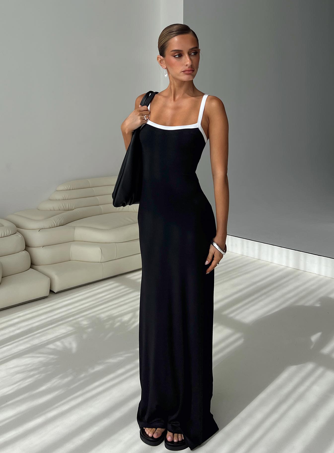 front view of model wearing Princess Polly Austrina Maxi Dress Black Square Neck 