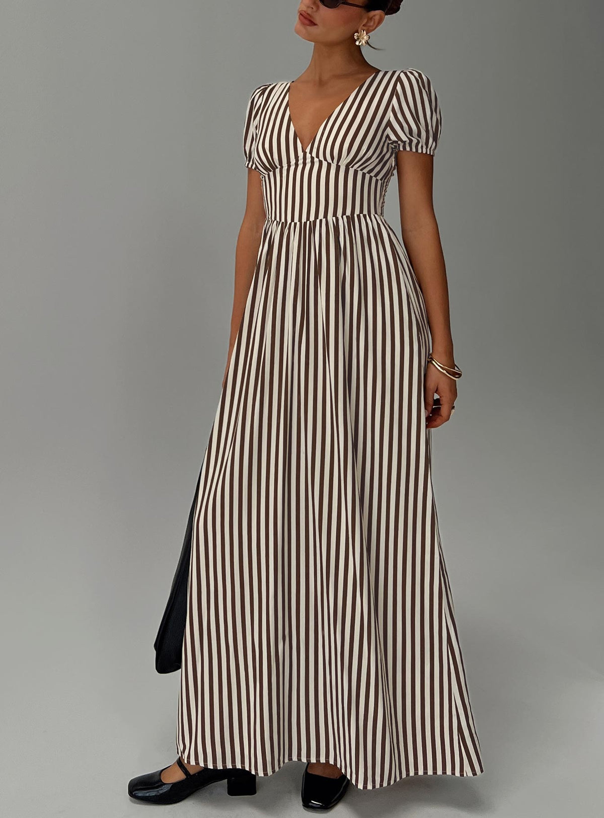 front view of model wearing Princess Polly Collyns Maxi Dress Beige Pinstripe V-Neck 