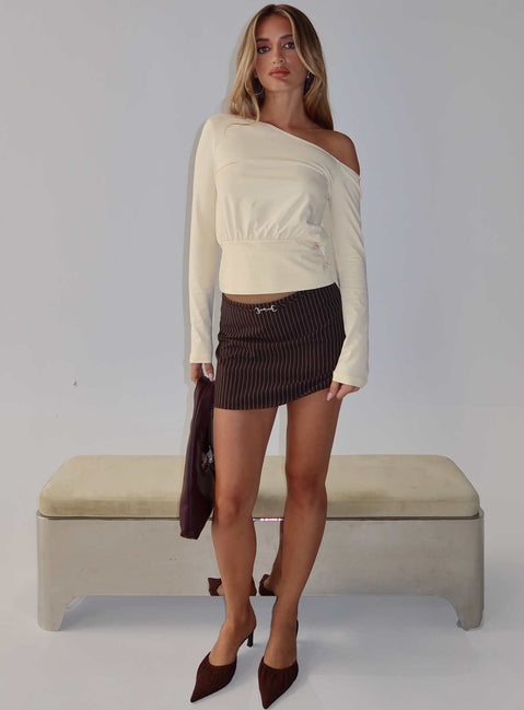   front view of model wearing Princess Polly Yellena Buckle Mini Skirt Brown Pinstripe Mini Skirts Skirts 
