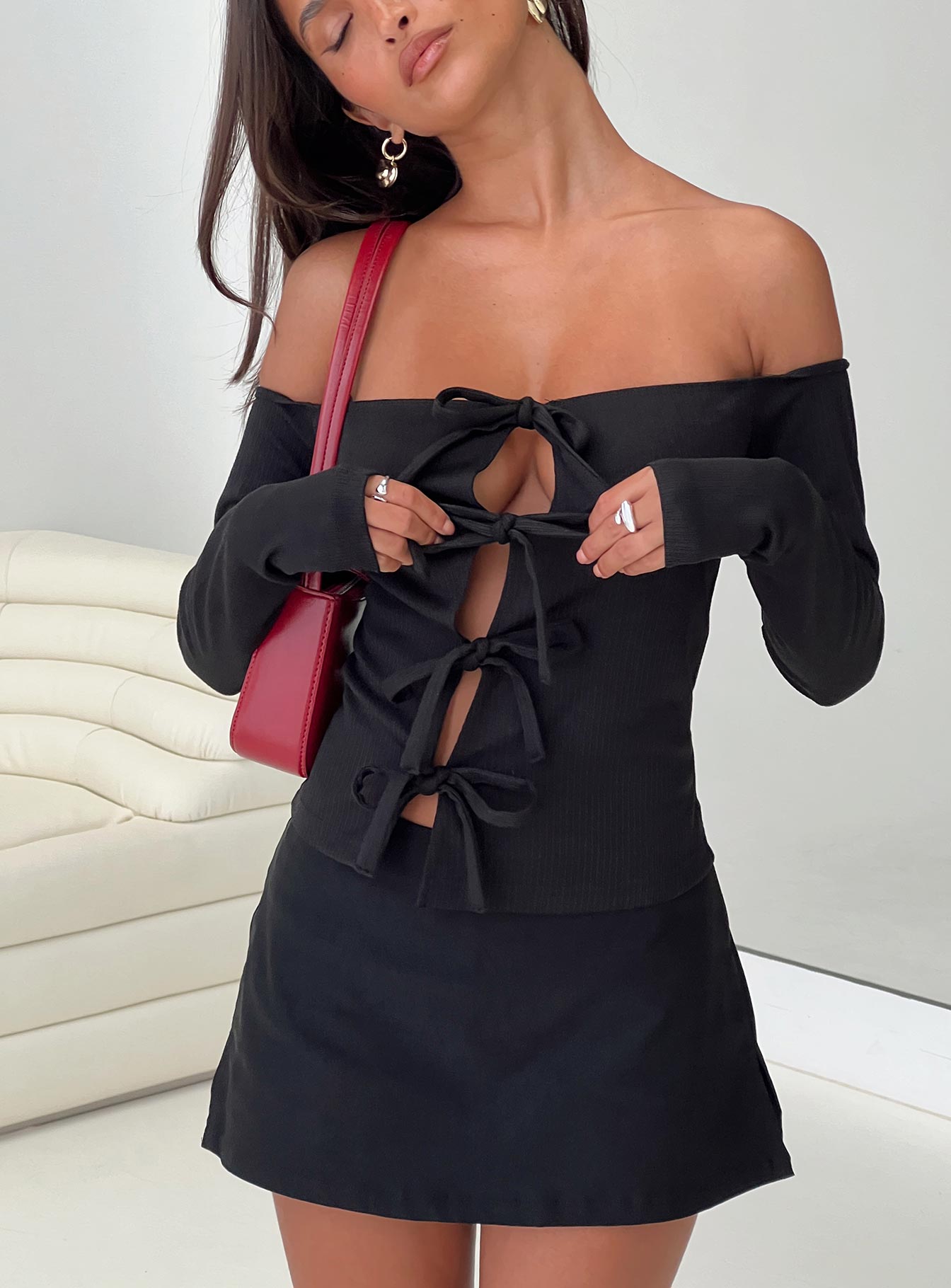 back view of model wearing Princess Polly Wish You The Best Off Shoulder Bow Detail Top Black Sleeveless straight 