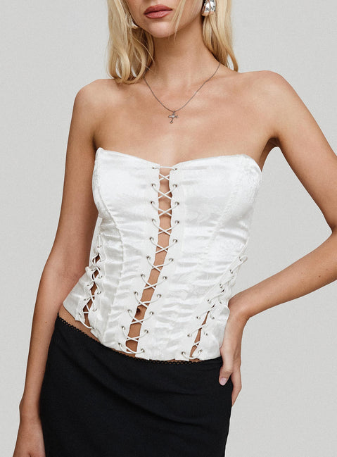 front view of model wearing Princess Polly Mochi Corset Top White Sleeveless Sweetheart 