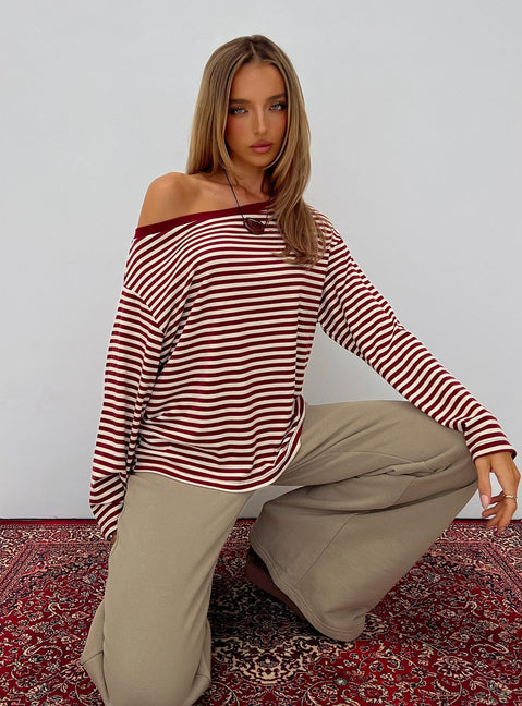 front view of model wearing Princess Polly Ralyssa Off Shoulder Long Sleeve Top Red Stripe Longline Jumpers Jumpers 