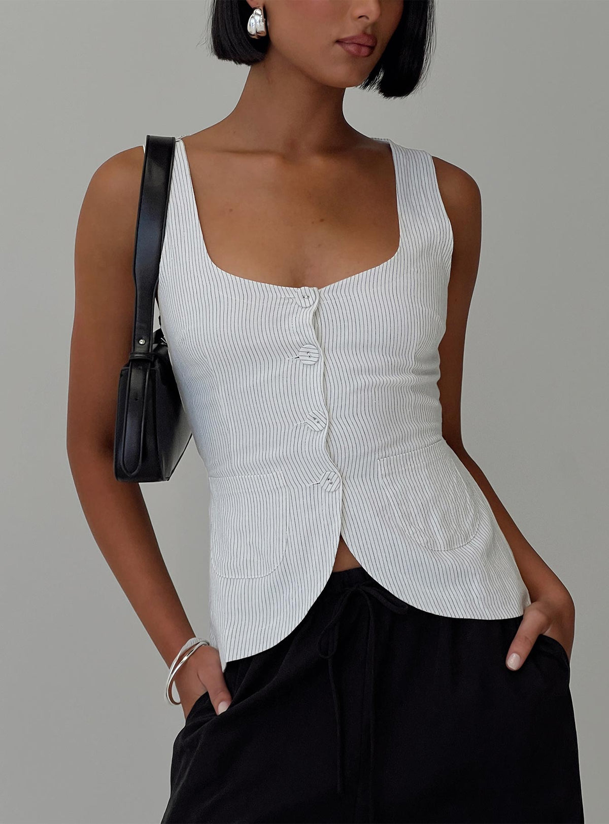 front view of model wearing Princess Polly Spirito Vest Top White Thin Stripe Sleeveless Square Neck 