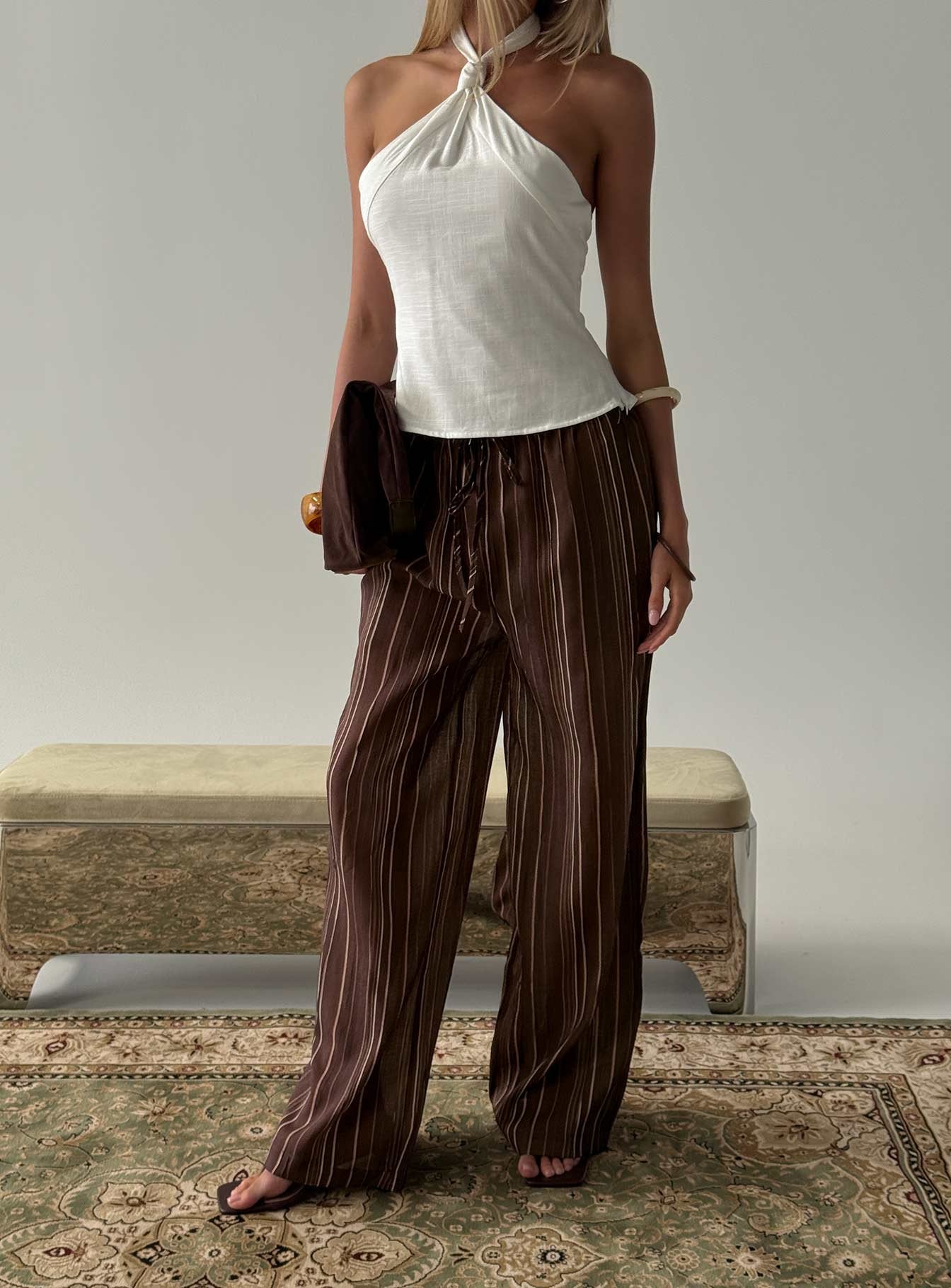 back view of model wearing Princess Polly Parklea Pants Brown Multi High Rise Pants 