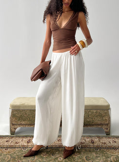front view of model wearing Princess Polly Moondancer Balloon Pants Cream Mid Rise Pants 