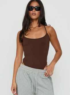 Showcasing the All Tied Up Bodysuit Brown womens-bodysuit with sleeveless design front view of model wearing Princess Polly