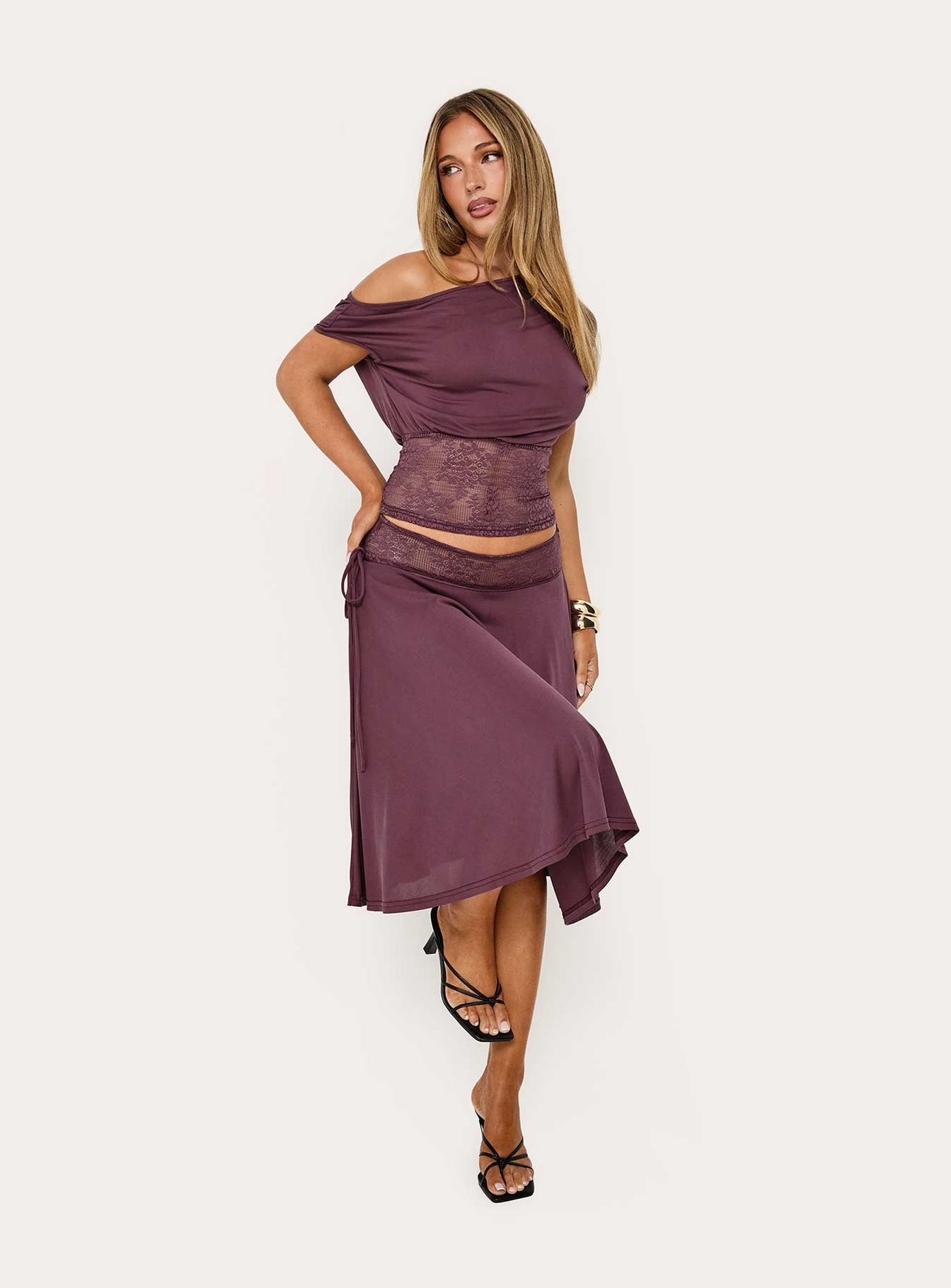 Showcasing the Marienna Lace Midi Skirt Plum in womens-skirts front view of model wearing Princess Polly