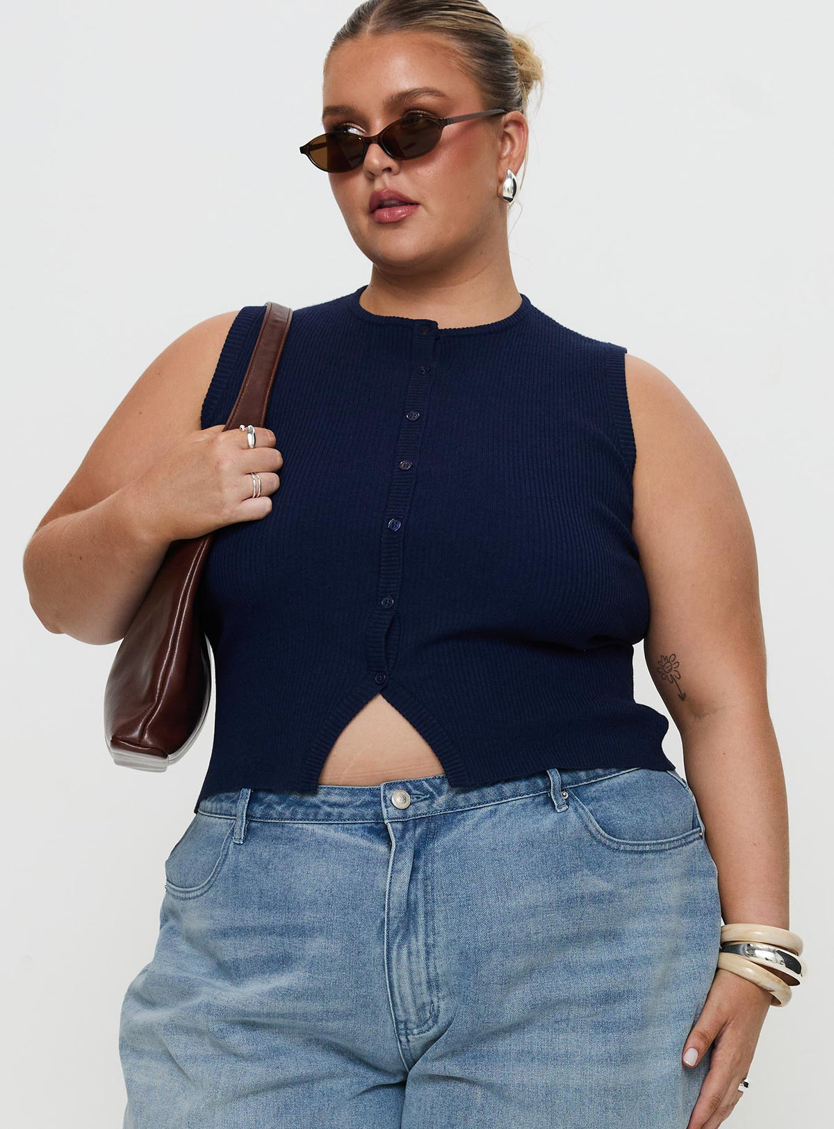 front view of model wearing Princess Polly Suzu Sleeveless Top Navy Curve Sleeveless Crew Neck 