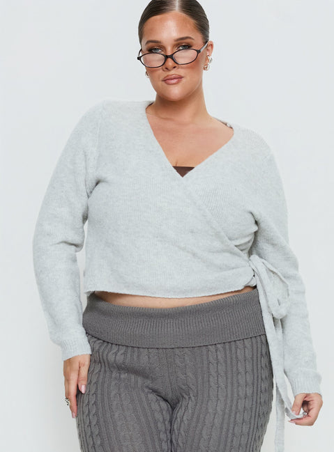 Showcasing the Tonee Wrap Knit Cardigan Grey Curve in a short length womens jumper with v-neck and oversized fit detail view of model wearing Princess Polly