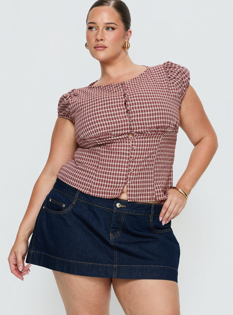  front view of model wearing Princess Polly Warna Low Rise Denim Mini Skirt Dark Wash Curve Mini Skirts 