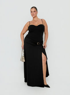 Showcasing the Nola Hardware Slit Maxi Skirt Black Curve in womens-skirts with a fitted aline silhouette and lace hem detail side view of model wearing