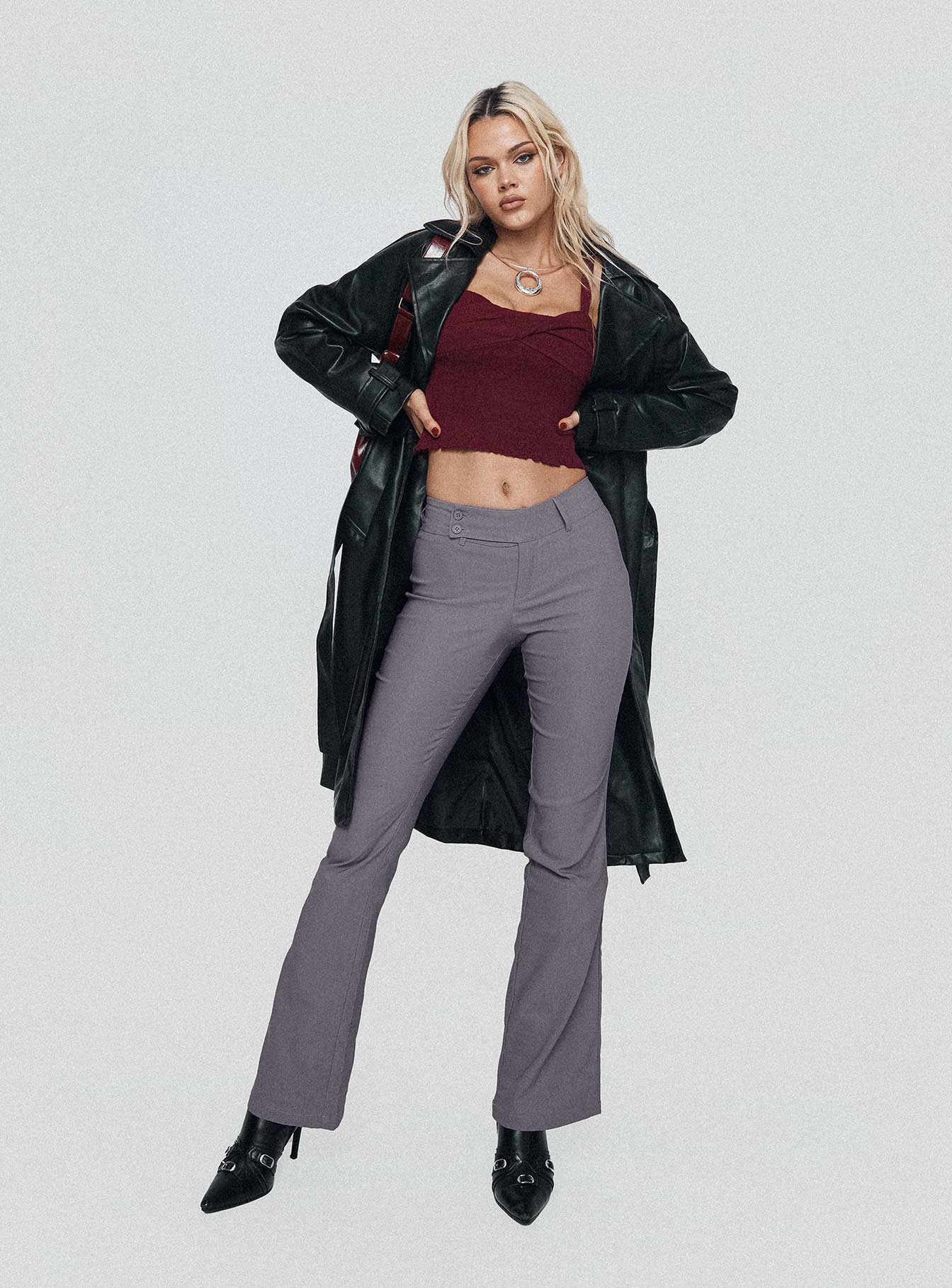 front view of model wearing Princess Polly Kinkirk Flared Pants Grey Tall Low Rise Pants 
