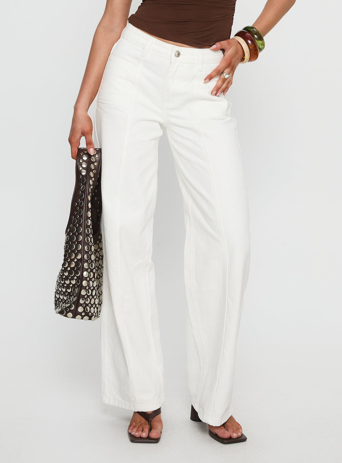 front view of model wearing Princess Polly Taji Wide Leg Jeans White High Rise Jeans 