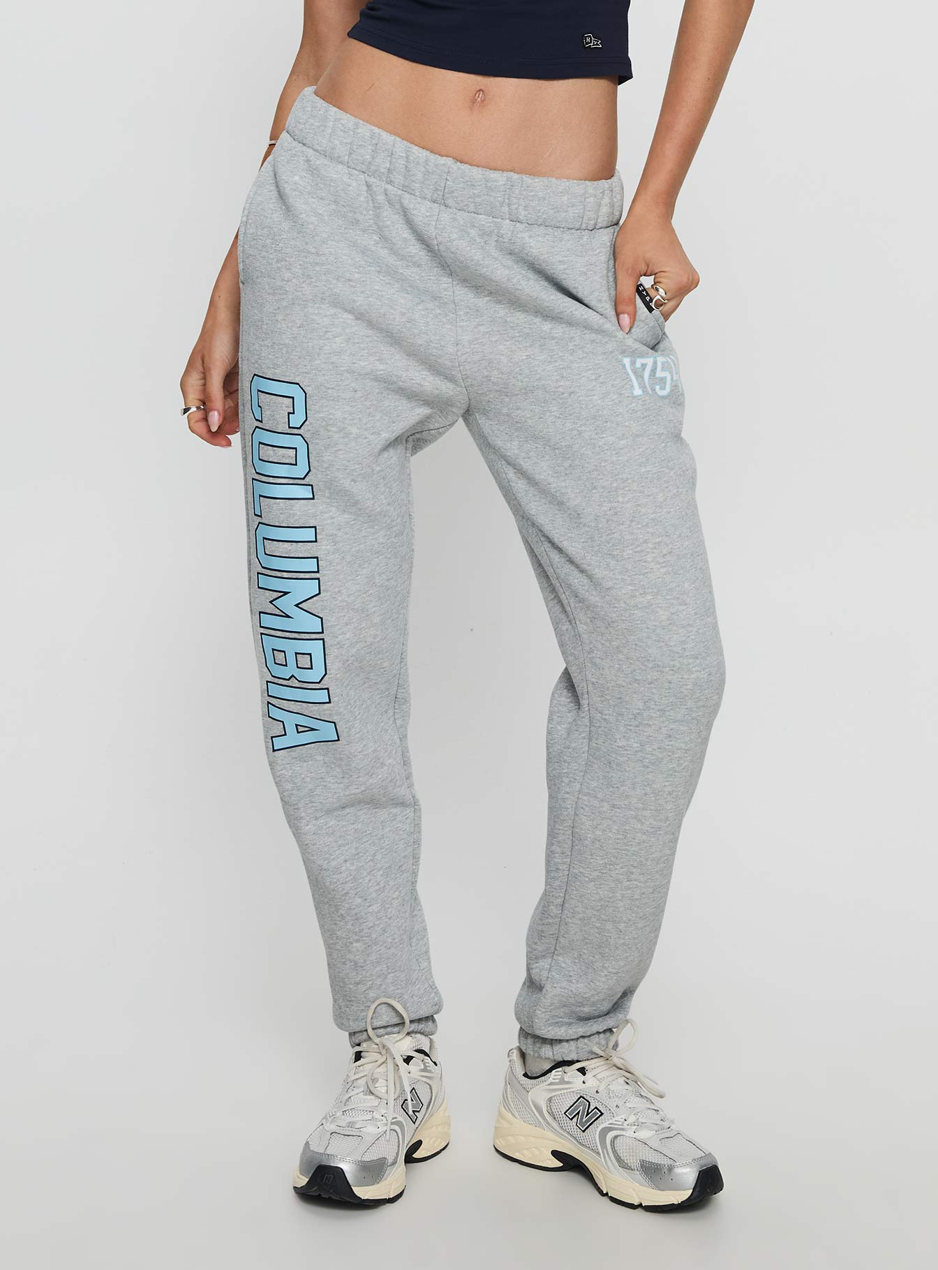 back view of model wearing Princess Polly Columbia Basic Sweatpants Grey Mid Rise Pants 