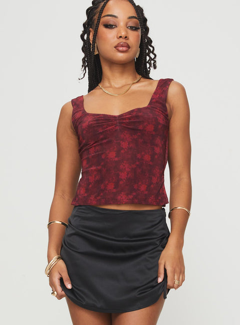 front view of model wearing Princess Polly Rehna Top Red Floral Sleeveless V-Neck 