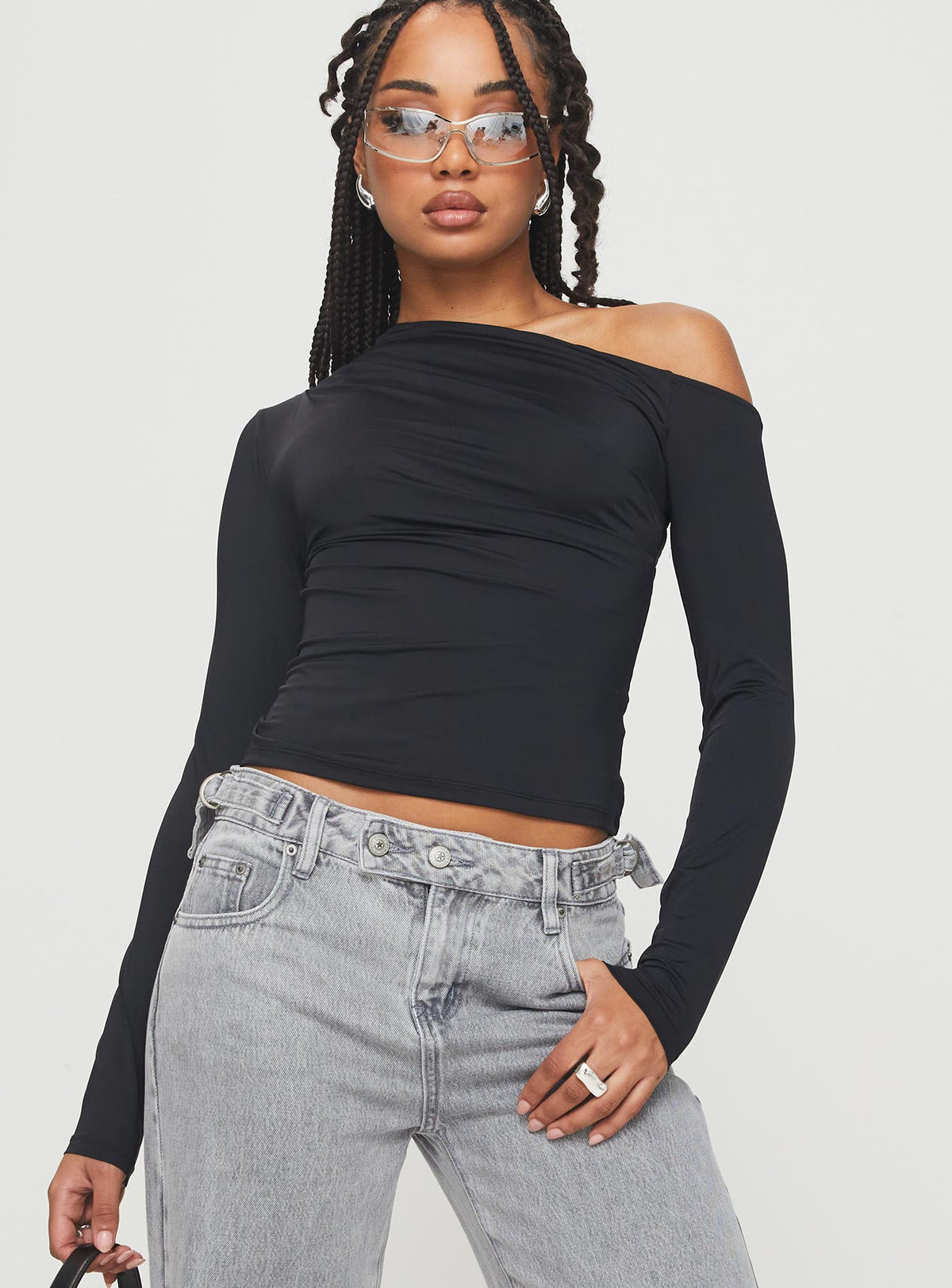 front view of model wearing Princess Polly Lasharie Long Sleeve Top Black Full Sleeves Asymmetric Neckline 