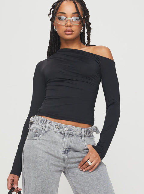 front view of model wearing Princess Polly Lasharie Long Sleeve Top Black Full Sleeves Asymmetric Neckline 
