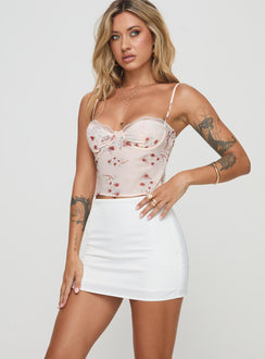 back view of model wearing Princess Polly Karley Satin Low Waist Mini Skirt White Mini Skirts 