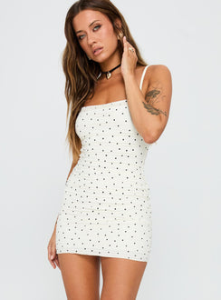 side view of model wearing Princess Polly Gradine Mini Dress Polka Dot Square Neck 
