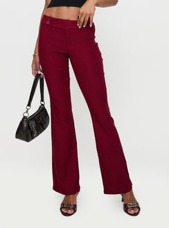 side view of model wearing Princess Polly Kinkirk Flared Pants Burgundy Low Rise Pants Pants 