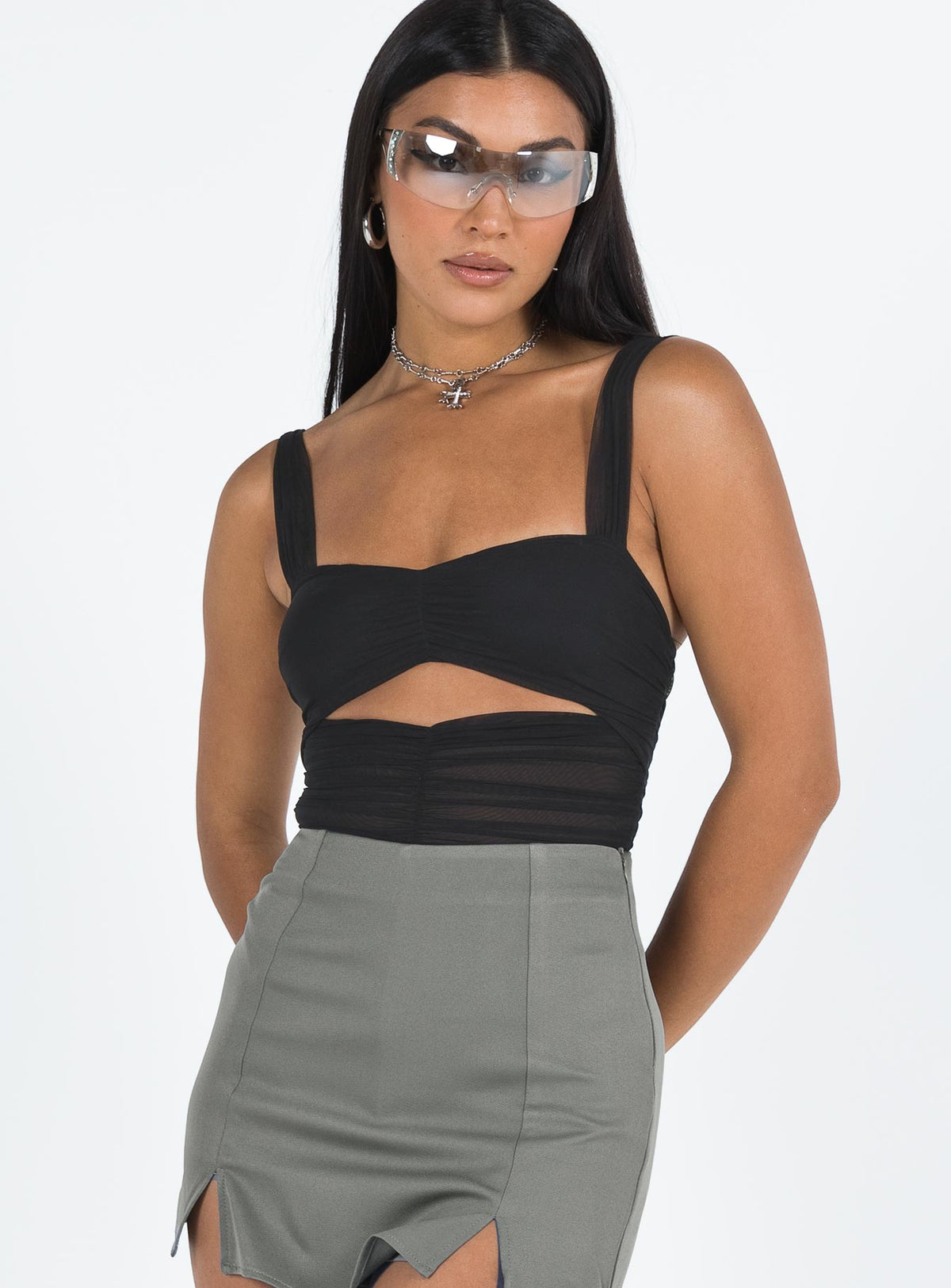 side view of model wearing Princess Polly Kalmia Bodysuit Black Sleeveless 