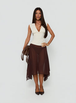 Featuring the Asali Asymmetrical Midi Skirt Chocolate womens-skirts in midi length front view of model wearing Princess Polly