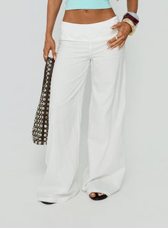 Showcasing Slow Days Broderie Anglais Mid Rise Pants White womens-regular-pants with mid-rise detail view of model wearing Princess Polly