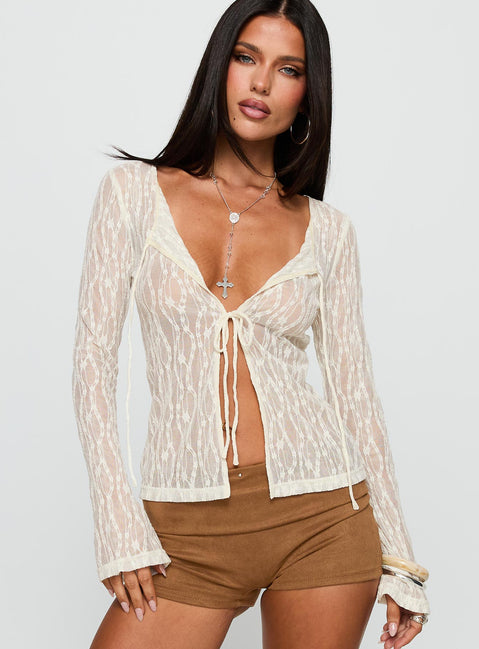 front view of model wearing Princess Polly Open Your Heart Tie Detail Long Sleeve Top Cream Full Sleeves Scoop Neck 