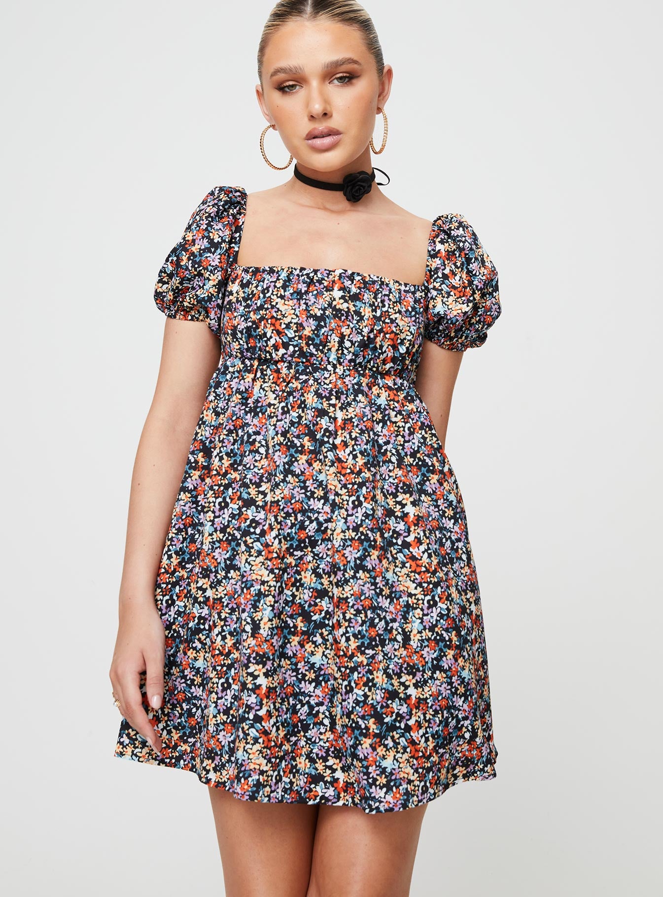 Front view of model wearing  front Princess Polly Square Neck  Let's Dance Mini Dress Black Floral
