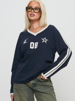 front view of model wearing Princess Polly Spectate Top Long Sleeve Navy Full Sleeves V-Neck 