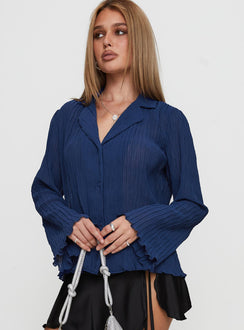 side view of model wearing Princess Polly Selma Shirt Navy Full Sleeves V-Neck 