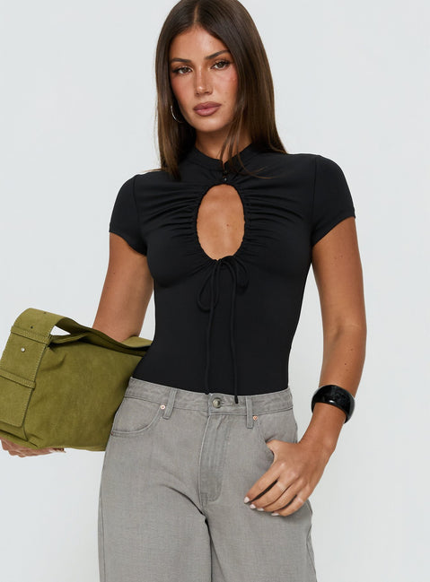 Featuring the Maeci Ruched Tie Detail Bodysuit Black womens-bodysuit with short sleeves and high-neck keyhole neckline side view of model wearing Princess Polly