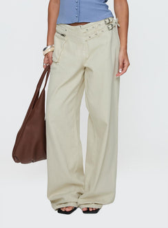 front view of model wearing Princess Polly Paltrow Mid Rise Wide Leg Cargo Jeans Cream Petite Low Rise Jeans 