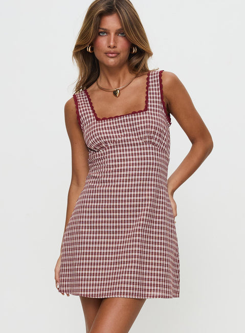 front view of model wearing Princess Polly Dasha Mini Dress Red Check Petite Square Neck 