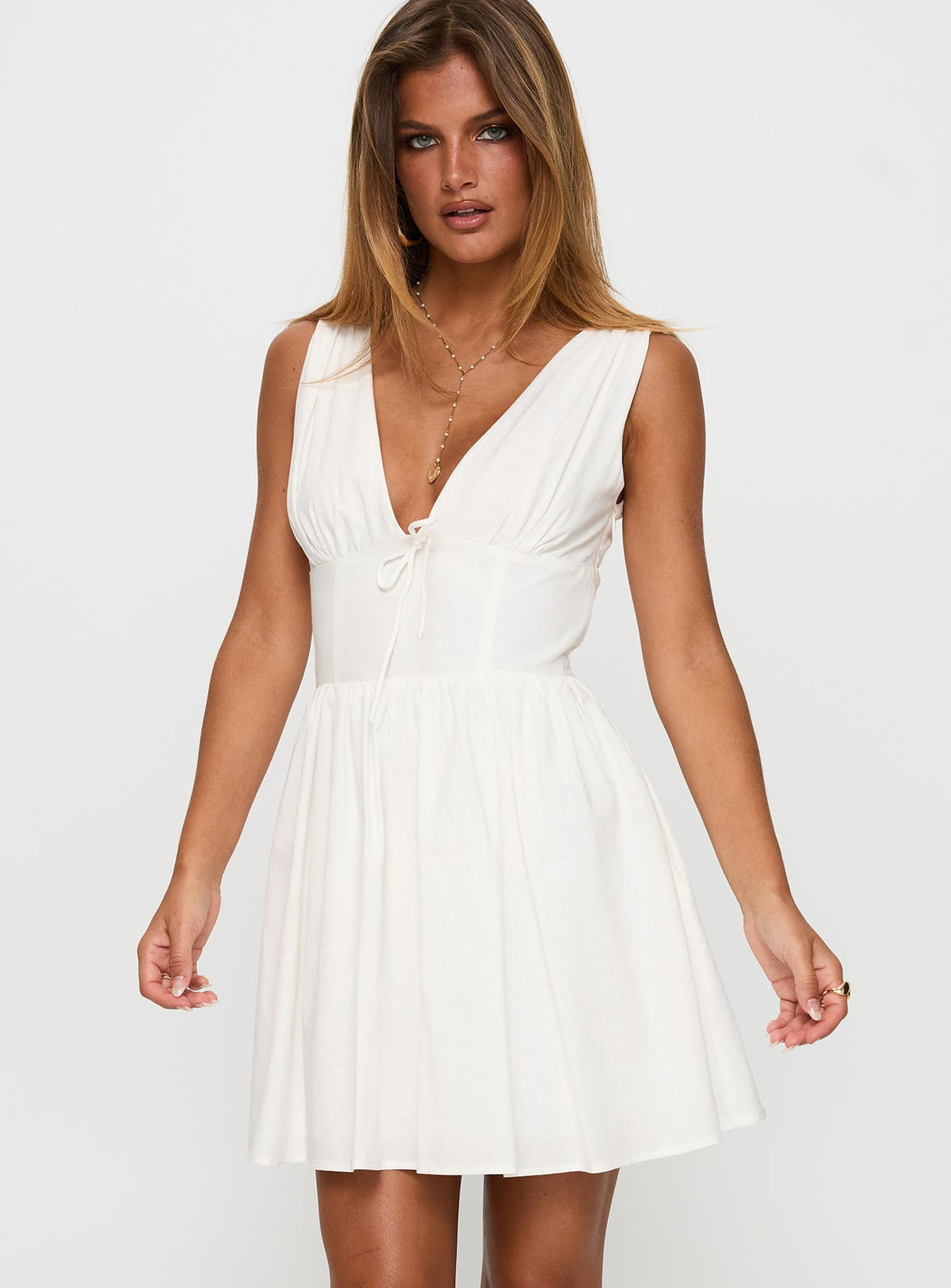 side view of model wearing Princess Polly Mattison Plunge Mini Dress White Plunger 