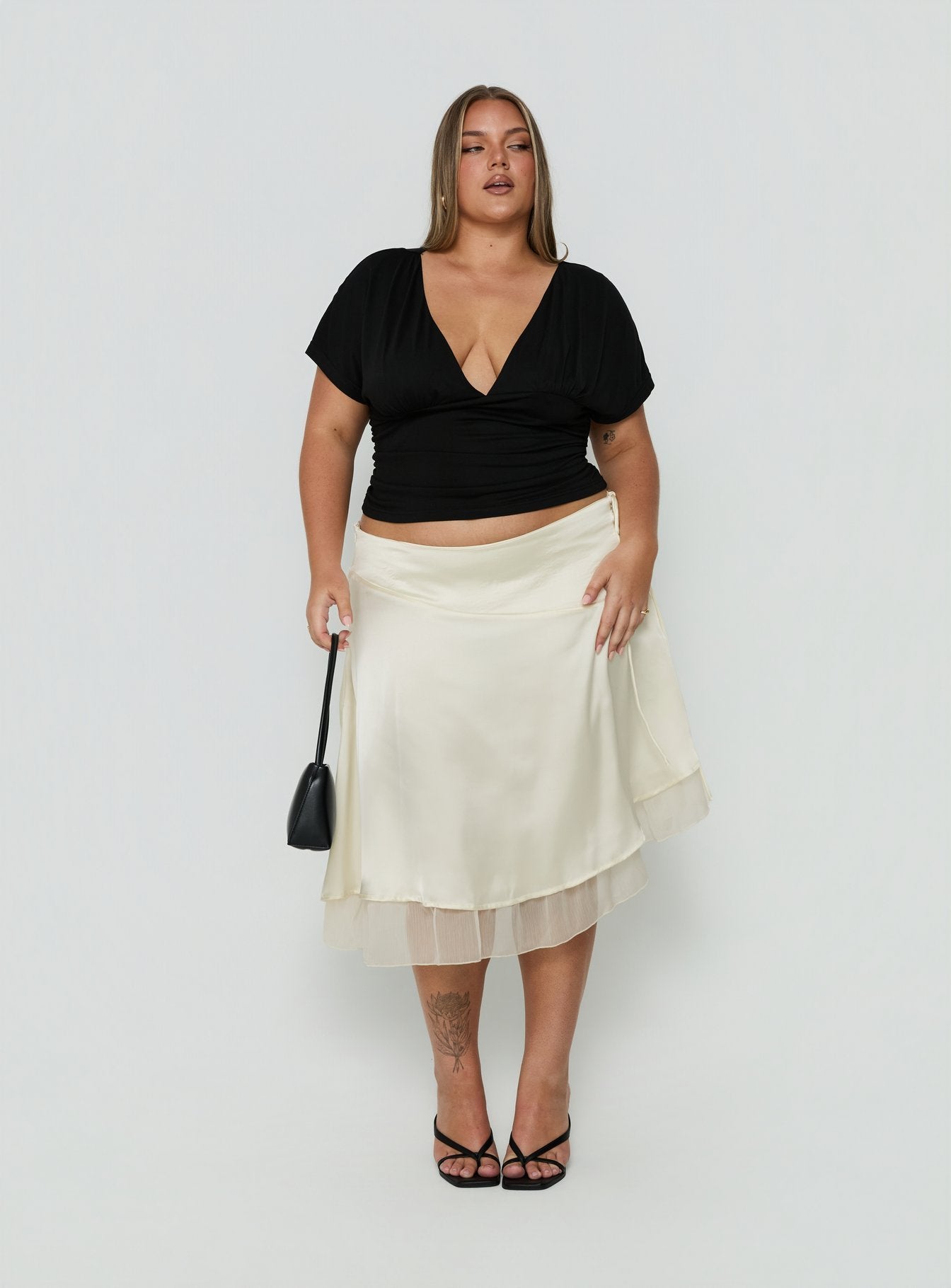 Featuring the Rosemead Satin Midi Skirt Cream Curve in womens-skirts with midi length detail view of model wearing